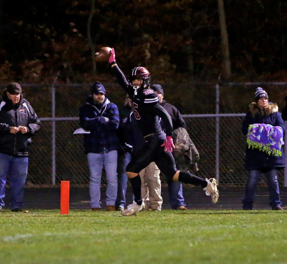 NorthWood senior Seth Russell celebrates as he scores a touchdown in the first quarter of the Class 4A football regional championship game against New Prairie Friday, Nov. 10, 2023, at NorthWood High School in Nappanee.