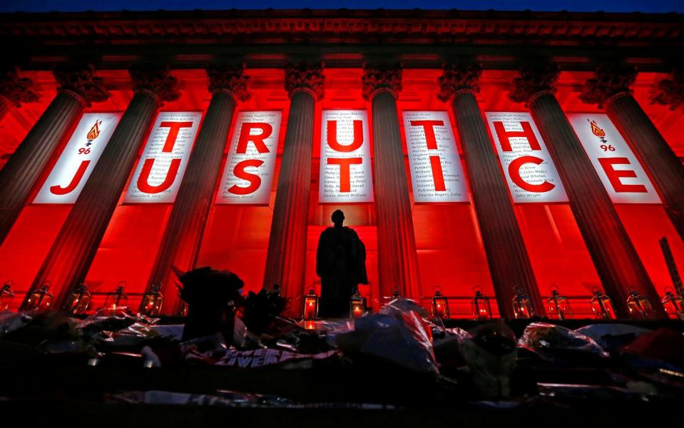 St George's Hall in Liverpool illuminated following a special commemorative service to mark the outcome of the Hillsborough inquest,  - Credit: Peter Byrne/PA