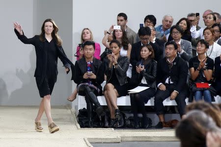 FILE PHOTO British-born designer Clare Waight Keller appears September 29, 2013 on the runway after presenting her Spring/Summer 2014 women's ready-to-wear collection for French fashion house Chloe during Fashion Week in Paris, France. Picture taken September 29, 2013. REUTERS/Benoit Tessier/File Photo