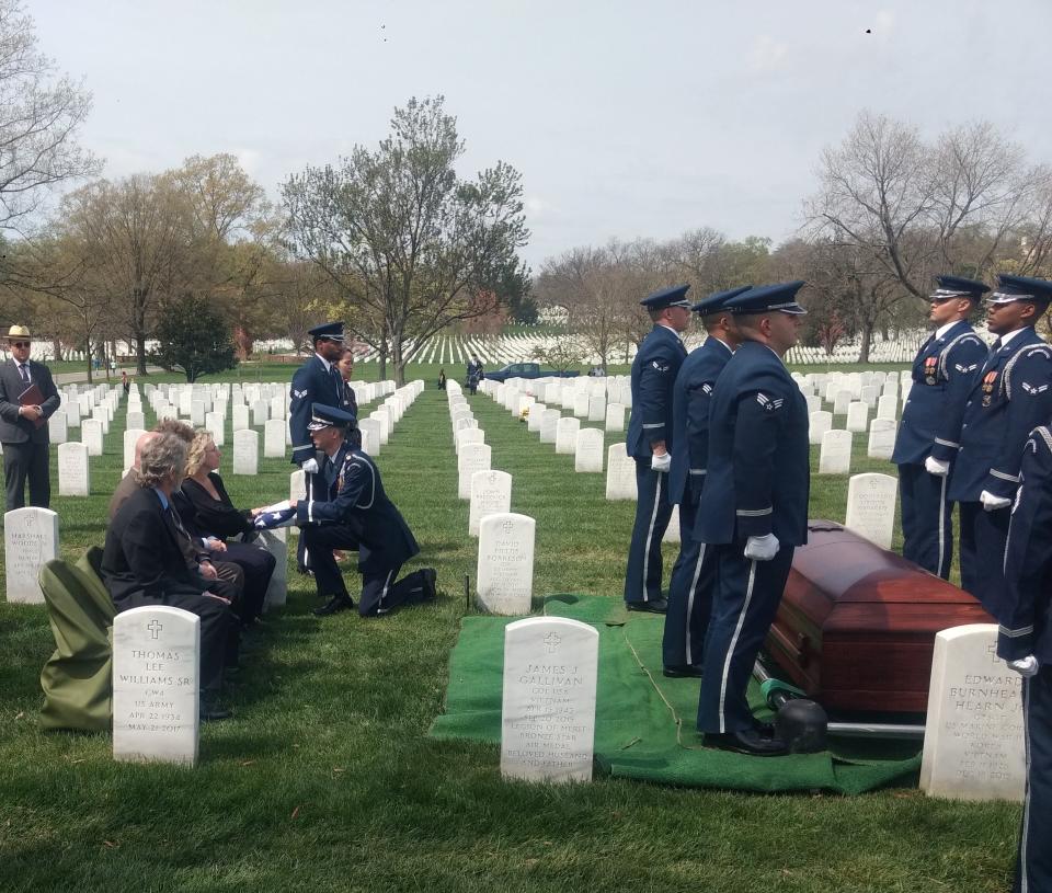 U.S. Air Force members present the family of Col. Mayer Littman with a flag in his honor at his burial last month at Arlington National Cemetery.