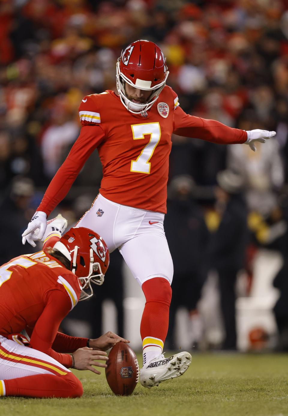 KANSAS CITY, MISSOURI - JANUARY 29: Harrison Butker #7 of the Kansas City Chiefs kicks a field goal against the Cincinnati Bengals during the first quarter in the AFC Championship Game at GEHA Field at Arrowhead Stadium on January 29, 2023 in Kansas City, Missouri. (Photo by David Eulitt/Getty Images)