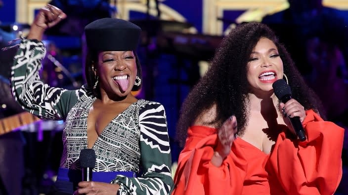 “2021 Soul Train Awards” hosts Tichina Arnold (left) and Tisha Campbell (right) speak onstage at the Apollo Theater during the show’s recent taping in New York City. (Photo: Bennett Raglin/Getty Images for BET)