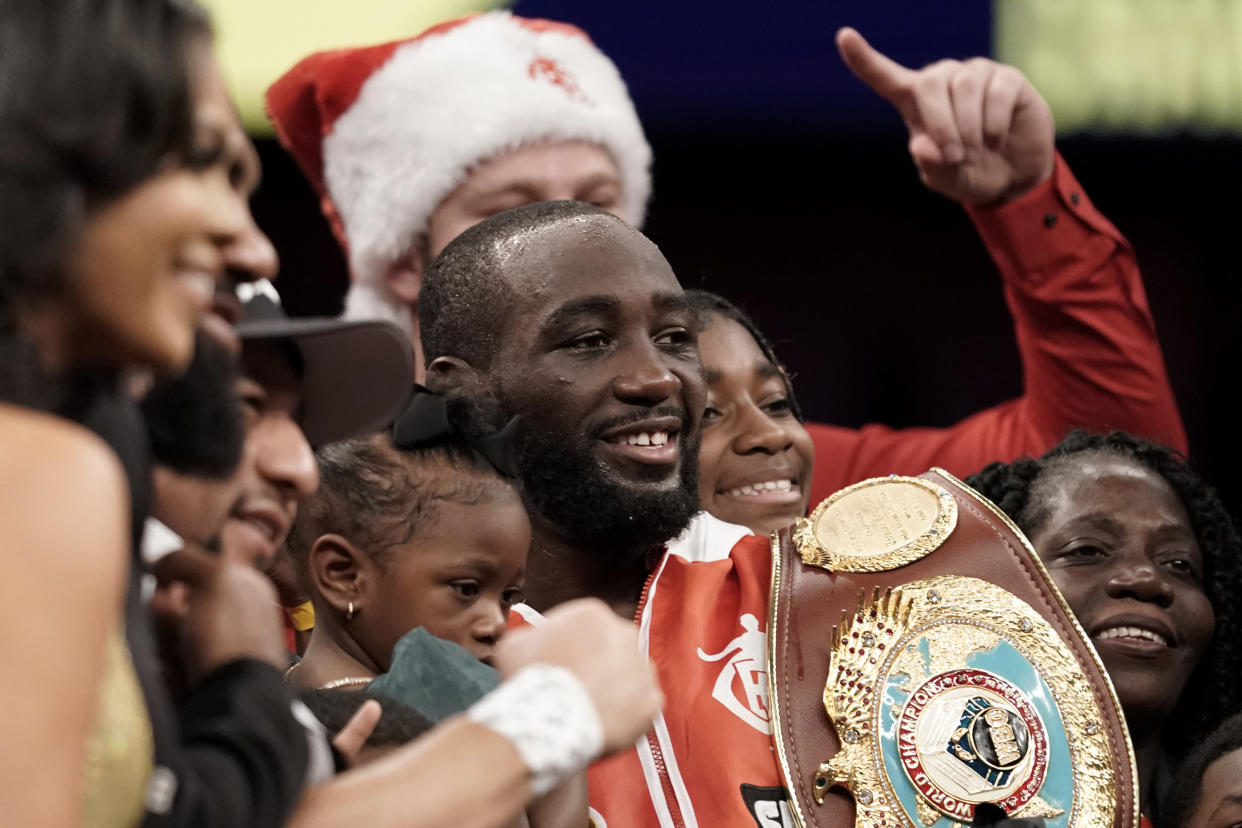 OMAHA, NEBRASKA - DECEMBER 10:  WBO champion Terence Crawford celebrates after knocking out David Avanesyan during their welterweight title fight at CHI Health Center on December 10, 2022 in Omaha, Nebraska. (Photo by Ed Zurga/Getty Images)