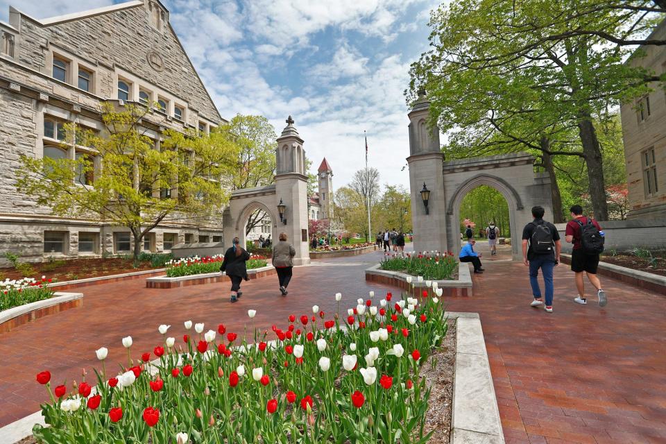 The iconic Sample Gates are seen on the Indiana University campus in Bloomington, Tuesday, April 23, 2019.
