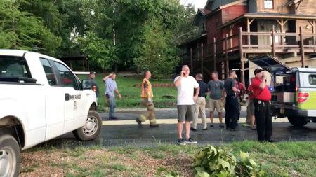 REFILE - CORRECTING TYPO Rescue personnel are seen after an amphibious "duck boat" capsized and sank, at Table Rock Lake near Branson, Stone County, Missouri, U.S. July 19, 2018 in this still image obtained from a video on social media. SOUTHERN STONE COUNTY FIRE PROTECTION DISTRICT/Facebook/via REUTERS