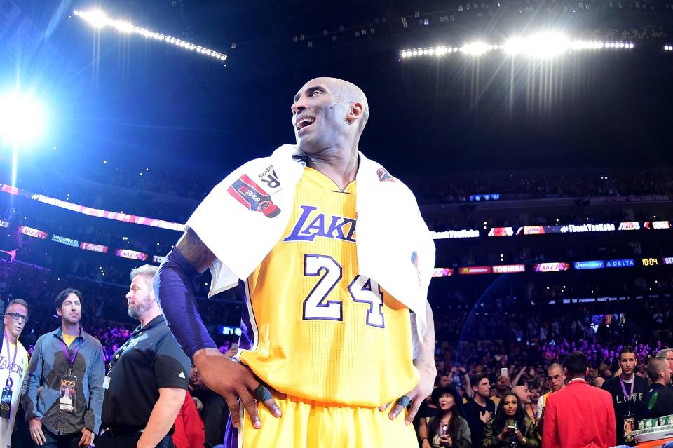 LOS ANGELES, CA - APRIL 13: Kobe Bryant #24 of the Los Angeles Lakers celebrates after scoring 60 points in his final NBA game at Staples Center on April 13, 2016 in Los Angeles, California. The Lakers defeated the Utah Jazz 101-96. (Photo by Harry How/Getty Images)