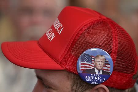 A supporter of U.S. Republican presidential candidate Donald Trump attends a campaign event in Pella, Iowa, United States, January 23, 2016. REUTERS/Jim Young