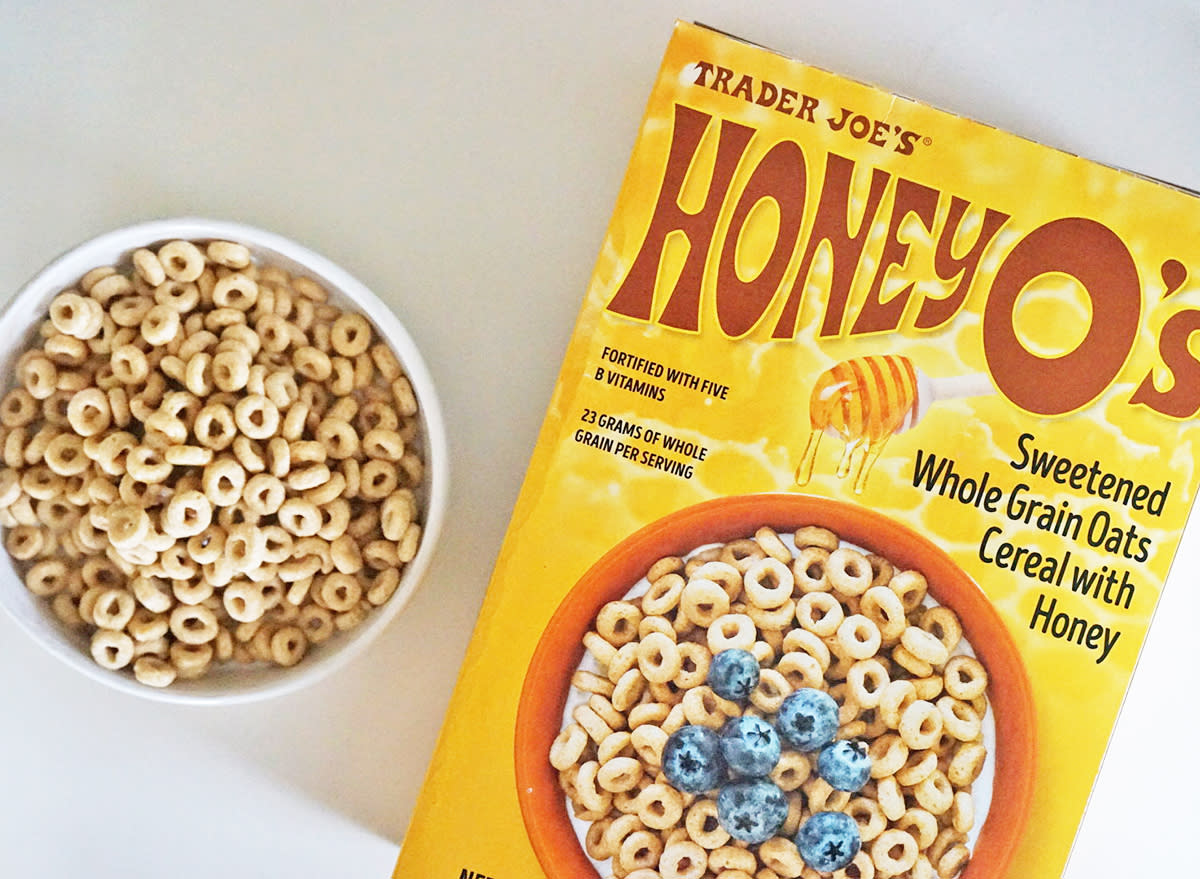 trader joe's honey o's cereal box and bowl.