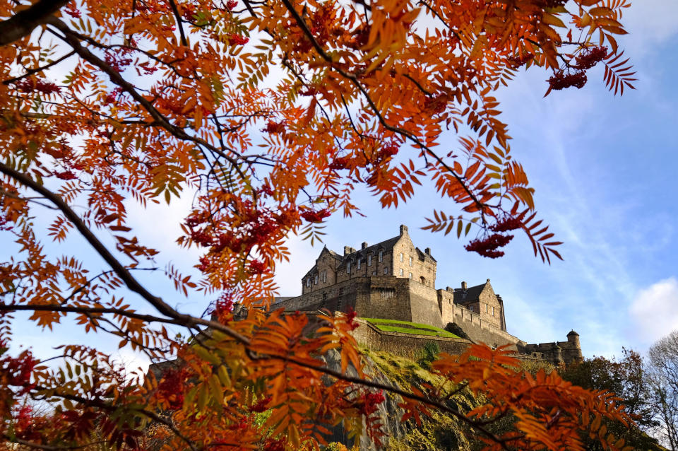 A view of Edinburgh Castle through the Rowan trees displaying their autumn colours in Princes Street Gardens. (Photo by Jane Barlow/PA Images via Getty Images)