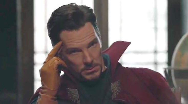 Doctor Strange wearing yellow gloves