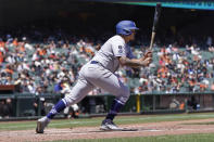 Los Angeles Dodgers' Julio Urias hits an RBI-single against the San Francisco Giants during the third inning of a baseball game in San Francisco, Sunday, May 23, 2021. (AP Photo/Jeff Chiu)