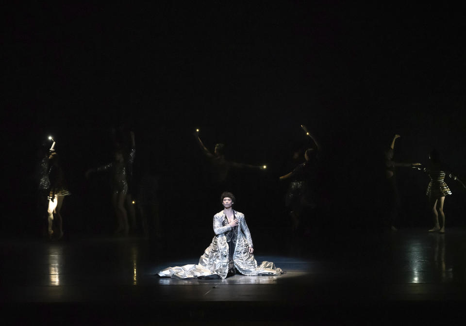 In this Saturday, Oct. 26, 2019, photo provided by the American Ballet Theatre Herman Cornejo performs in Twyla Tharp's A Gathering of Ghosts in New York. Cornejo has been a favorite of New York ballet audiences ever since he set foot on the American Ballet Theatre stage 20 years ago. (Kyle Froman via AP)
