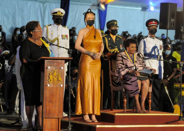 Barbados&#39; Prime Minister Mia Mottley awards Rihanna with the honor of National Hero during a ceremony to declare Barbados a republic in Bridgetown, Barbados, Nov. 30. (Photo: RANDY BROOKS via Getty Images)