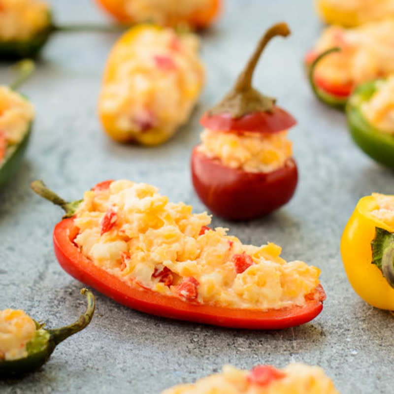 <p>Magnolia Days</p><p>This Southern spread makes a fun appetizer when you stuff it into mini bell peppers. <a href="http://magnoliadays.com/2014/pimento-cheese-stuffed-peppers/" rel="nofollow noopener" target="_blank" data-ylk="slk:Get the recipe HERE!;elm:context_link;itc:0;sec:content-canvas" class="link rapid-noclick-resp">Get the recipe HERE!</a></p>