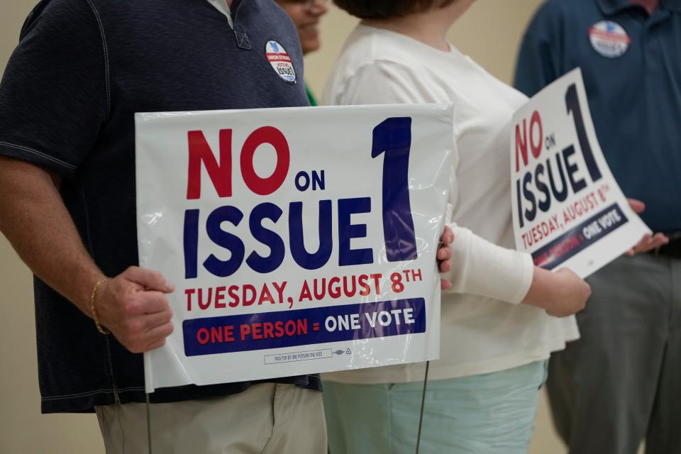 Jul 8, 2023; Columbus, Ohio, USA;  Volunteers gather at the International Brotherhood of Electrical Workers 683 union hall to write postcards and pick up shirts and yard signs before going out and knocking doors to encourage people to vote against Issue 1 in the August special election.