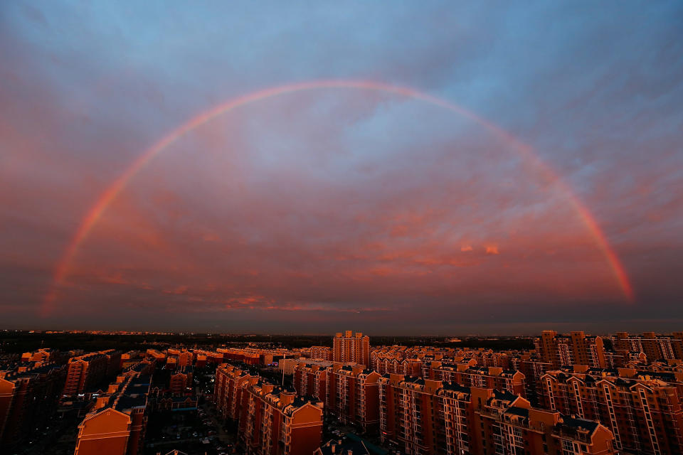 A rainbow appears over Beijing on Aug. 3.&nbsp;Air pollution levels in and around the city&nbsp;<a href="http://www.huffingtonpost.com/entry/smog-smothers-beijing-during-cop21-climate-talks_565d6a04e4b072e9d1c3180f">progressively worsened</a>&nbsp;throughout the year, to the point that the government had to issue&nbsp;two "<a href="http://www.huffingtonpost.com/entry/beijing-red-alert-pollution_566562f2e4b079b2818f16dd">red alerts</a>" for pollution <a href="http://www.huffingtonpost.com/entry/beijing-smog-red-alert_56741b99e4b014efe0d516a0">within weeks</a> of each other in December 2015.