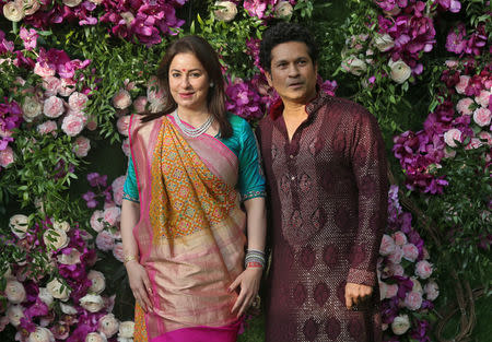 Former Indian cricketer Sachin Tendulkar and his wife Anjali pose during a photo opportunity at the wedding ceremony of Akash Ambani, son of the Chairman of Reliance Industries Mukesh Ambani, at Bandra-Kurla Complex in Mumbai, India, March 9, 2019. REUTERS/Francis Mascarenhas