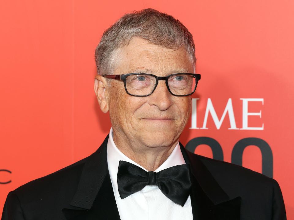 Photograph of Bill Gates wearing a bow-tie and suit whilst smiling