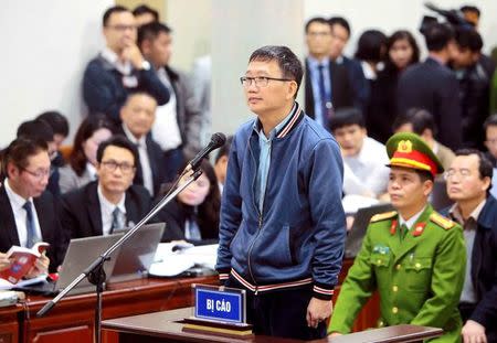 PVC's former chairman Trinh Xuan Thanh (C) stands at the court in Hanoi, Vietnam January 8, 2018. VNA/Doan Tan via REUTERS