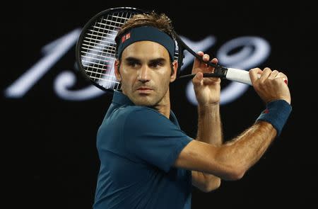 Tennis - Australian Open - Fourth Round - Melbourne Park, Melbourne, Australia, January 20, 2019. Switzerland’s Roger Federer in action during the match against Greece’s Stefanos Tsitsipas. REUTERS/Edgar Su