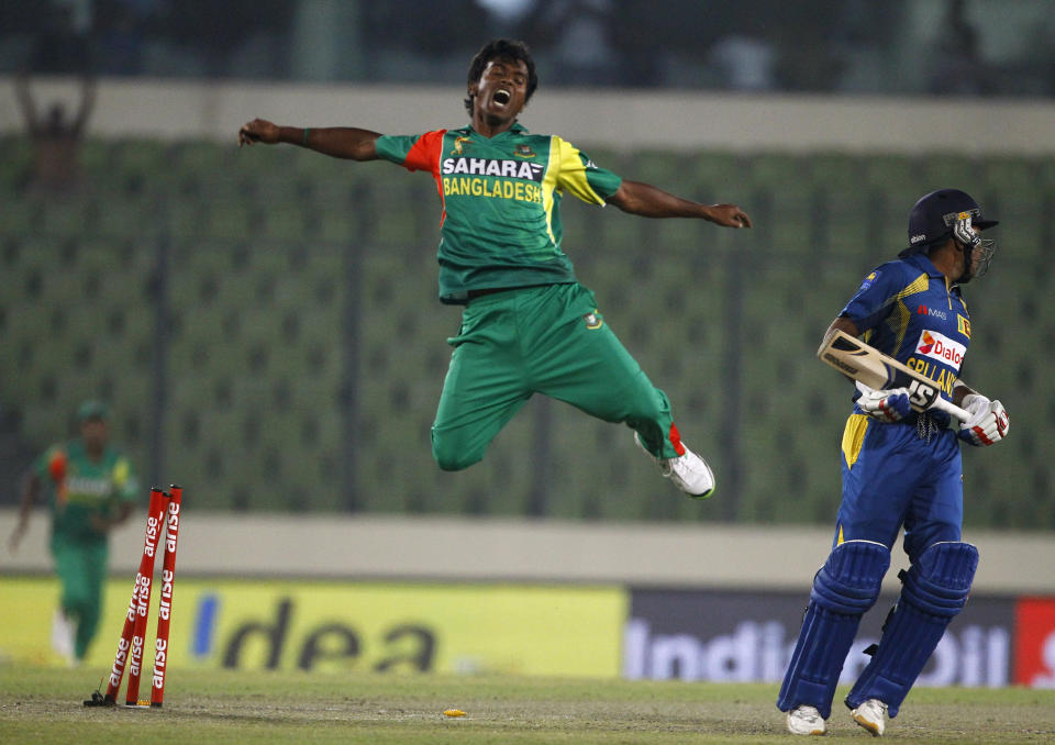 Bangladesh’s Rubel Hossain jumps as he celebrates the wicket of Sri Lanka’s Mahela Jayawardene during the Asia Cup one-day international cricket tournament in Dhaka, Bangladesh, Thursday, March 6, 2014. (AP Photo/A.M. Ahad)