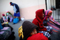 Members of a migrants caravan from Central America rest at the end of the caravan journey through Mexico, prior to preparations for an asylum request in the U.S., in Tijuana, Baja California state, Mexico April 26, 2018. REUTERS/Edgard Garrido