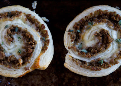 <div class="caption-credit"> Photo by: Photo by Kimberley Hasselbrink</div><b>Herbed Beef Pinwheels</b> <br> <br> Cook ground beef with chopped garlic and herbs such as thyme, parsley and oregano. Pulse in a food processor until finely chopped. Spread mustard on a sheet of puff pastry, then sprinkle the ground beef mixture on top, followed by a layer of grated swiss cheese. Roll up tightly and freeze for 10 minutes. Cut crosswise into 1/2-inch-thick slices and bake in a 400° oven until golden, 12 to 15 minutes.