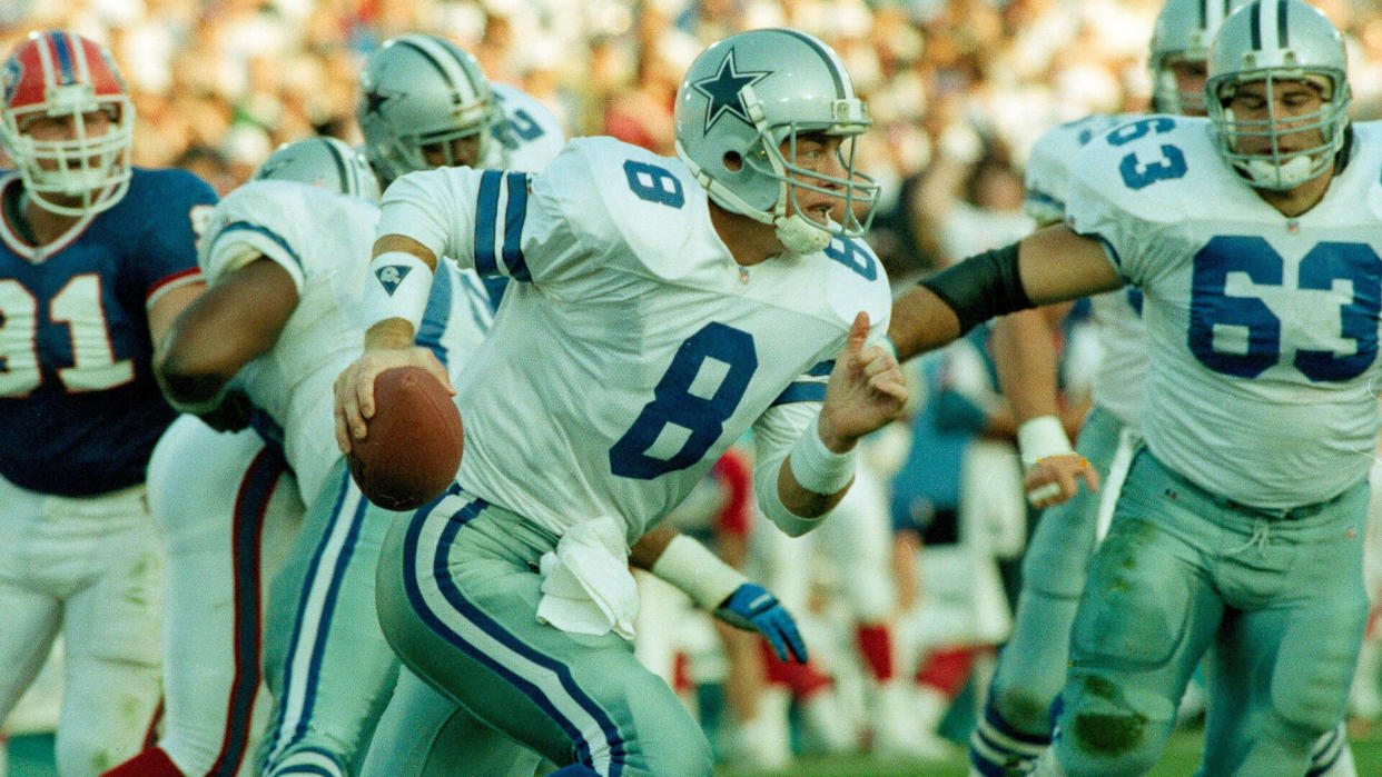 Mandatory Credit: Photo by Susan Ragan/AP/Shutterstock (6578059a)Aikman Dallas Cowboys' quarterback Troy Aikman scrambles during the first quarter in the Super Bowl in Pasadena, Calif.