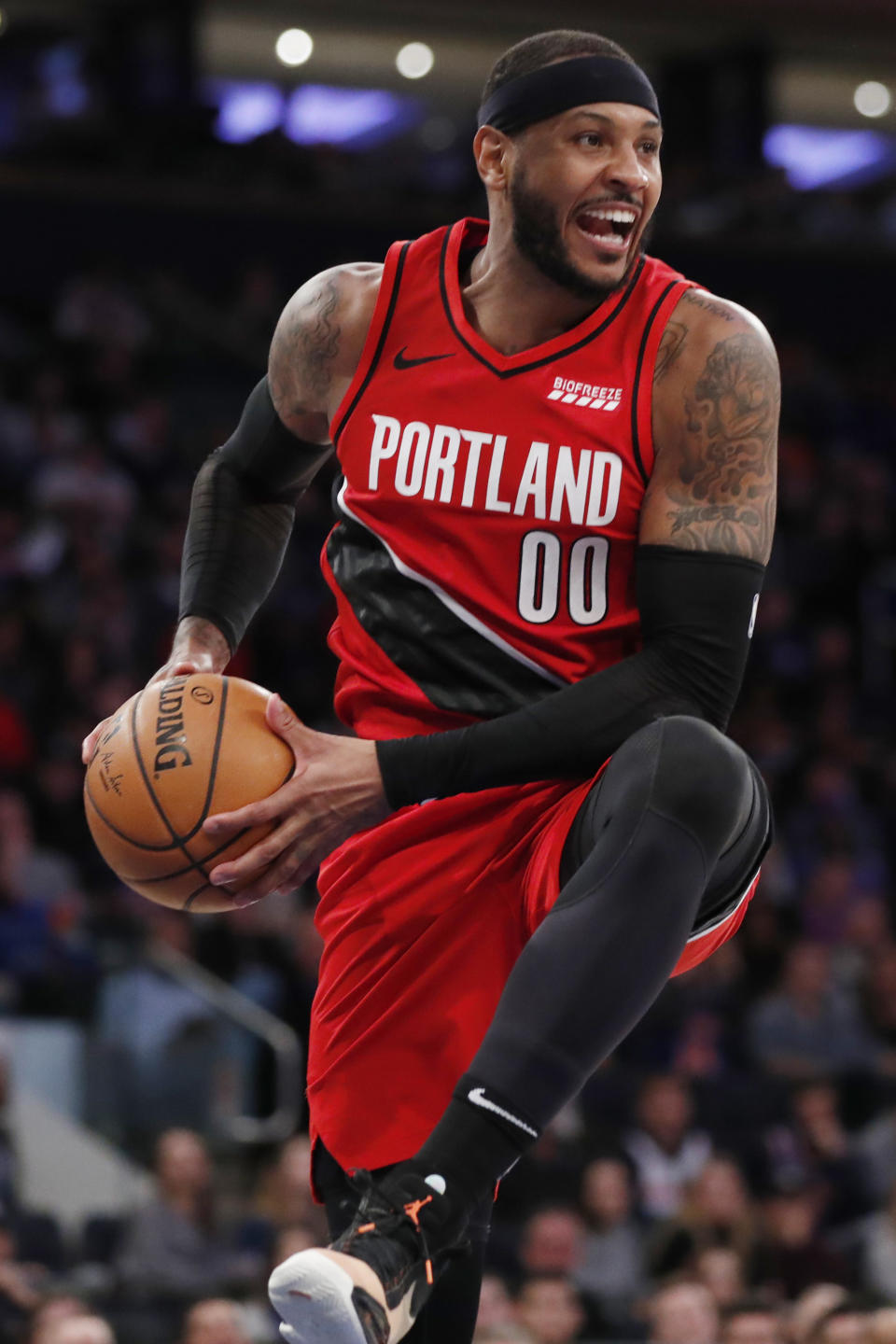 Portland Trail Blazers forward Carmelo Anthony pulls down a rebound during the second half of the team's NBA basketball game against the New York Knicks in New York, Wednesday, Jan. 1, 2020. (AP Photo/Kathy Willens)