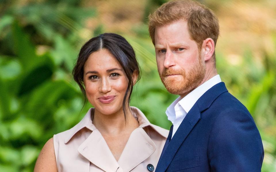 Harry and Meghan are 'stepping back' from the Royal family - Splash News