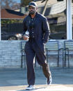 <p>Mike Colter grabs some water while making his way throgh L.A. on Dec. 26.</p>