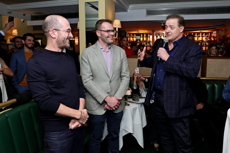 NEW YORK, NEW YORK - OCTOBER 19: (L-R) Honorees Darren Aronofsky, Sam Hunter, and Brendan Fraser speak during Variety, The New York Party at American Bar on October 19, 2022 in New York City. (Photo by Jamie McCarthy/Variety via Getty Images)