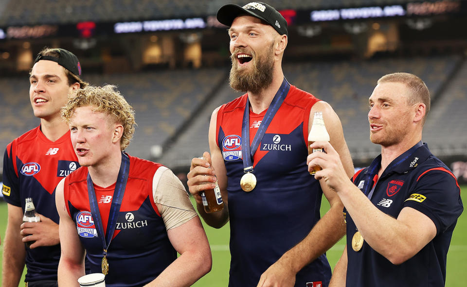 Clayton Oliver, Max Gawn and Simon Goodwin at the Melbourne Demons.
