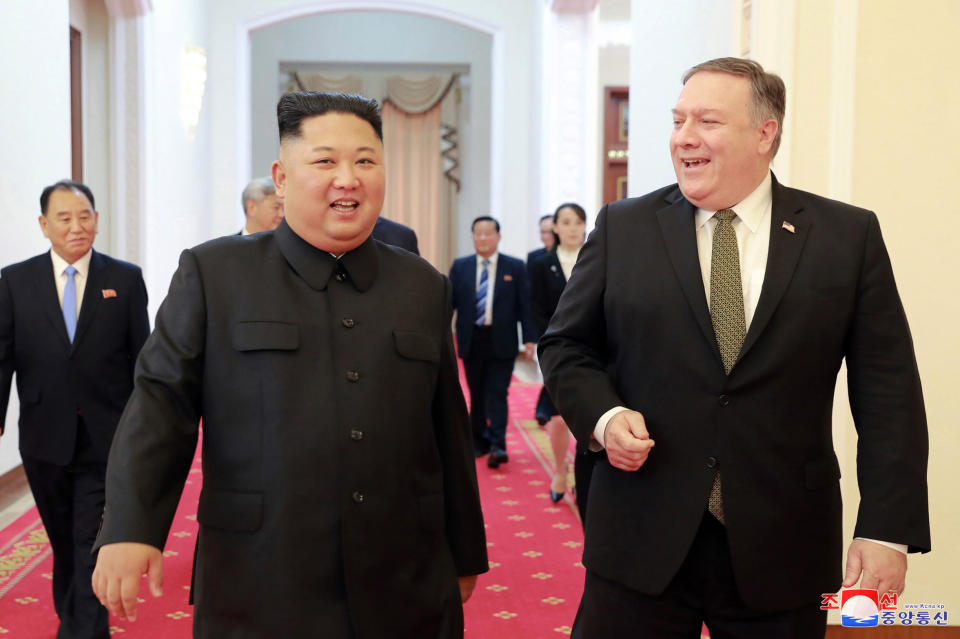 In this Oct. 7, 2018, photo provided by the North Korean government, North Korean leader Kim Jong Un, center left, and U.S. Secretary of State Mike Pompeo walk together before their meeting in Pyongyang, North Korea. Pompeo said that he and Kim made unspecified progress Sunday toward an agreement for the North to give up its nuclear weapons, though there was no immediate indication whether Pompeo had managed to arrange a much-anticipated second summit between Kim and President Donald Trump. Independent journalists were not given access to cover the event depicted in this image distributed by the North Korean government. The content of this image is as provided and cannot be independently verified. Korean language watermark on image as provided by source reads: "KCNA" which is the abbreviation for Korean Central News Agency. (Korean Central News Agency/Korea News Service via AP, File)