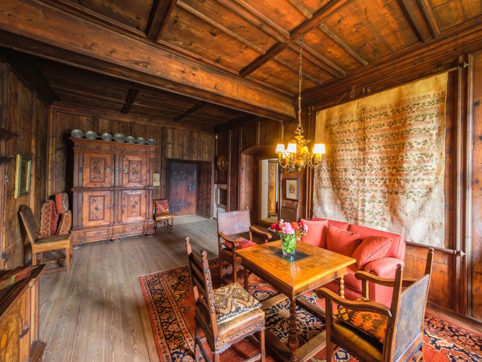 <p>Or sit down in one of the castle’s more rustic rooms. (Concierge Auctions) </p>