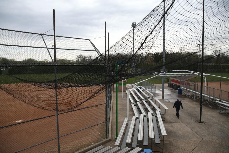 South Bend Parks Department worker Mark Florkowski walks through the Byers Softball Complex on Tuesday, April 23, 2024, in South Bend. On April 19, Indiana's State Budget Committee awarded the complex $3 million for upgrades, including an overhaul of the main softball fields to install new sod and infield material.