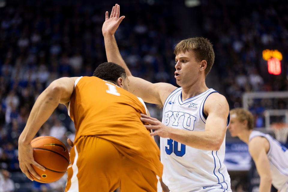 BYU guard Dallin Hall blocks Texas forward Dylan Disu on Saturday, Jan. 27, 2024. BYU won 84-72. | Marielle Scott, Deseret News