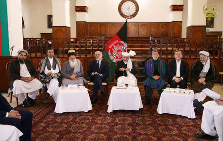 Afghanistan President Ashraf Ghani is seen with Afghan delegations at the Presidential palace in Kabul, Afghanistan April 17, 2019. Presidential Palace/Handout via REUTERS