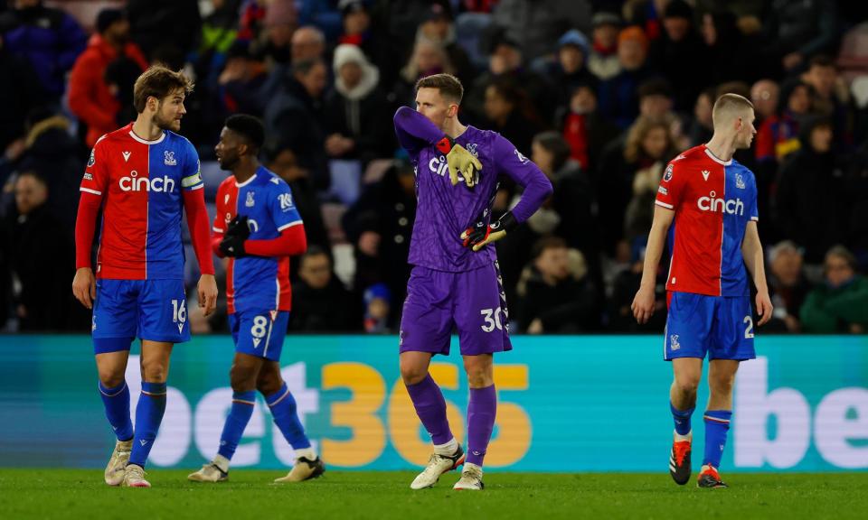 <span>Crystal Palace players struggle to rouse themselves after Chelsea’s third and final goal.</span><span>Photograph: Tom Jenkins/The Guardian</span>