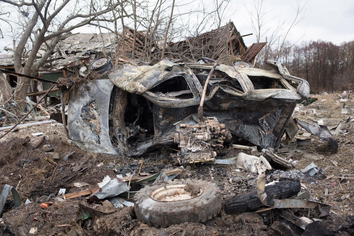 A view of a burned car where 4 people died as a result of a shelling on March 5, 2022, in Markhalivka, Ukraine.