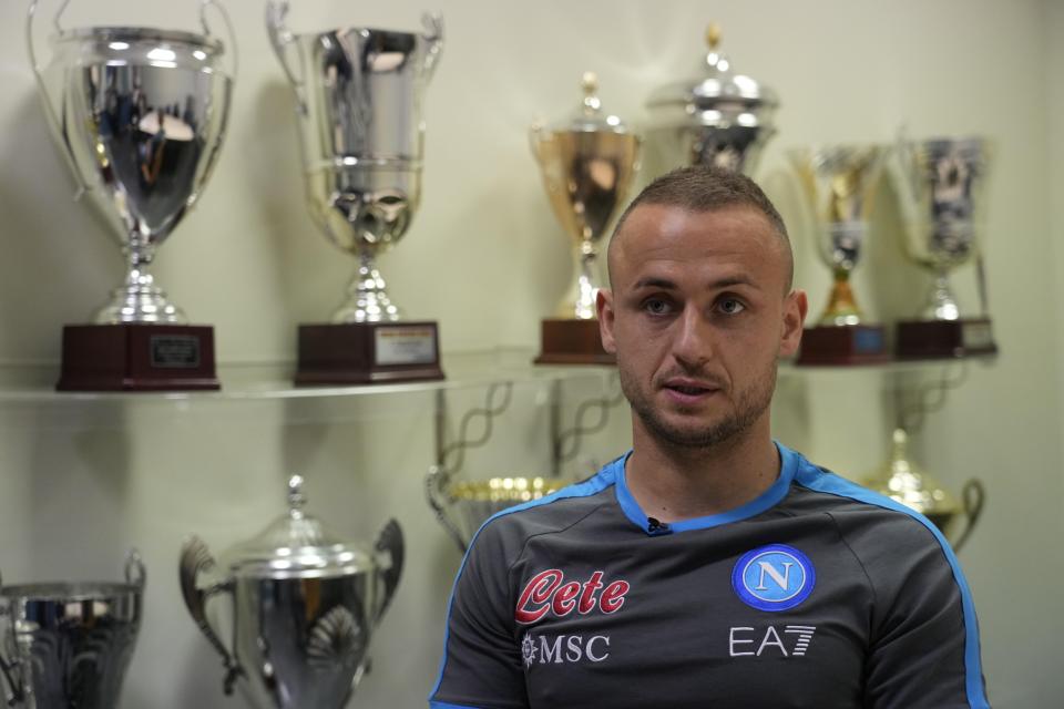 Napoli's Stanislav Lobotka is interviewed by the Associate Press at the end of a training session at the club headquarters in Castel Volturno, near Naples, Wednesday, April 5, 2023. Unlike other major cities in Italy, Naples has only one major soccer team and the fan support for Napoli is felt on every street and alleyway. Lobotka, who developed with Ajax’s junior squad and then played for Danish club Nordsjaelland and Spanish side Celta Vigo before transferring to Italy, had never experienced anything like Napoli.(AP Photo/Gregorio Borgia)