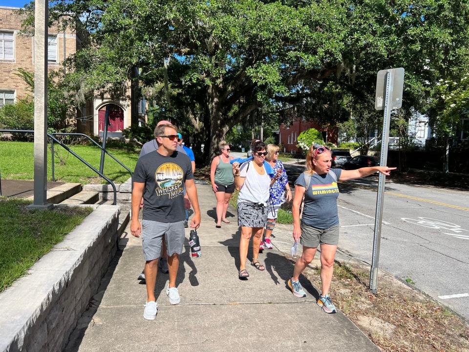 Guests stroll through Wilmington's Historic districts with guide Amanda Leese, Wilmington Walking Tours.