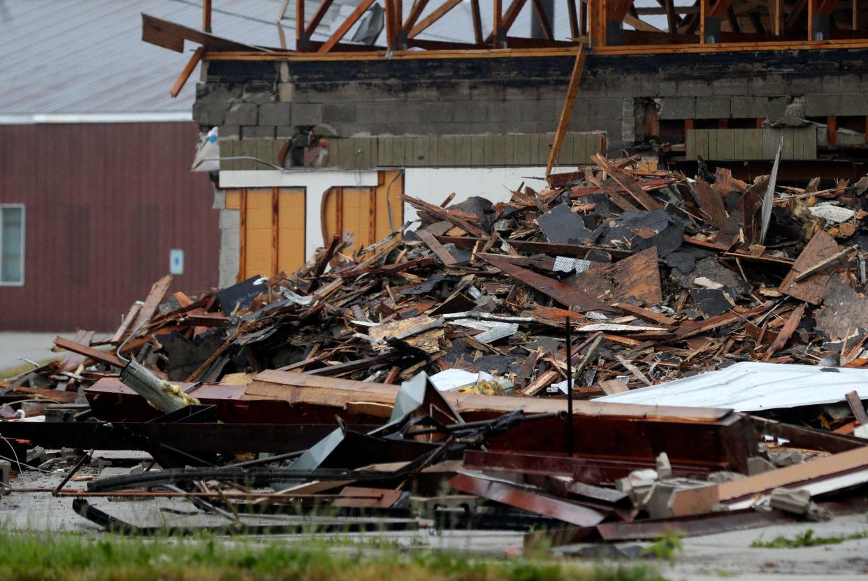 Debris from demolition of the former Eagles Club on Vanderbraak Street pictured on June 13, 2023, in Green Bay, Wis.