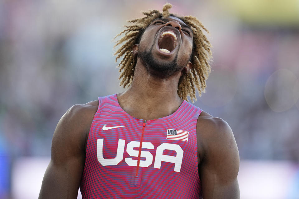 Noah Lyles, of the United States, reacts after winning a final in the men's 200-meter run at the World Athletics Championships on Thursday, July 21, 2022, in Eugene, Ore. The running mecca that embedded Nike into American culture was an easy choice to host the first track world championships on U.S. soil. It will take time to determine whether Eugene, Oregon lived up to expectations.They say sagging viewership totals and flat revenue across the broader Olympic world make it critical to bring the cornerstone sport of the games back to its glory days in the U.S. before they return to Los Angeles in 2028. (AP Photo/Ashley Landis)