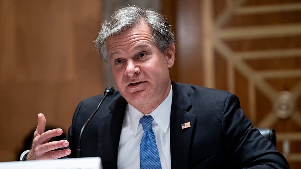 FBI Director Christopher Wray testifies during a Senate Homeland Security & Governmental Affairs Committee hearing to discuss security threats 20 years after the 9/11 terrorist attacks on Tuesday, September 21, 2021