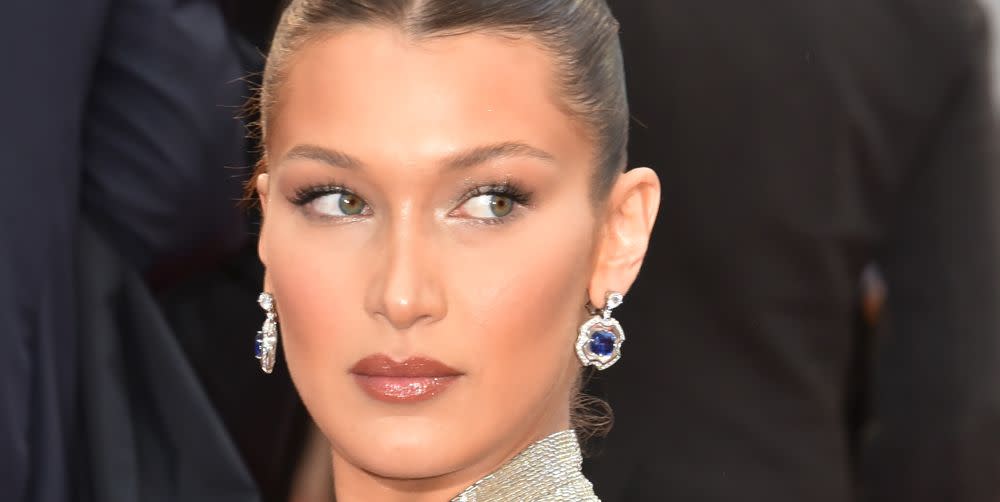 bella hadid avant garde makeup brush hairstyle