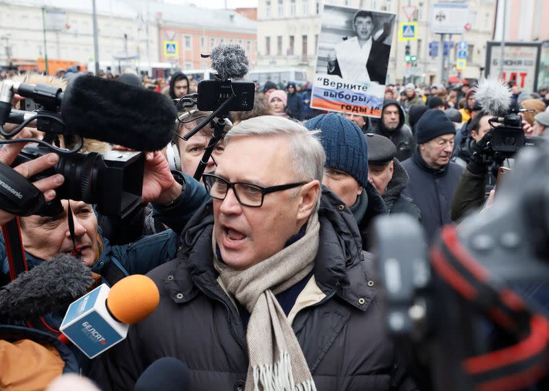 Russian opposition figure Mikhail Kasyanov takes part in a rally to mark the 5th anniversary of opposition politician Boris Nemtsov's murder and to protest against proposed amendments to the country's constitution, in Moscow