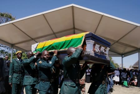 Coffin containing the body of former Zimbabwean President Robert Mugabe arrives at his rural village in Kutama, Zimbabwe