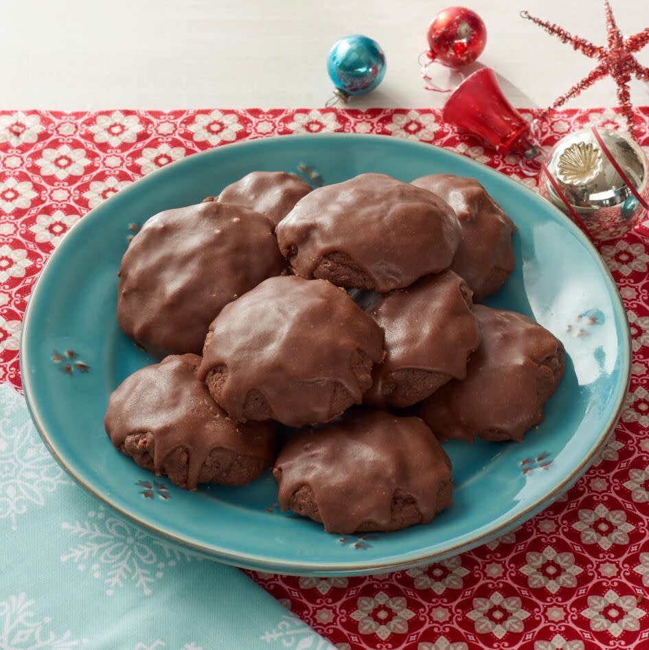 texas sheet cake cookies on blue plate with christmas ornaments