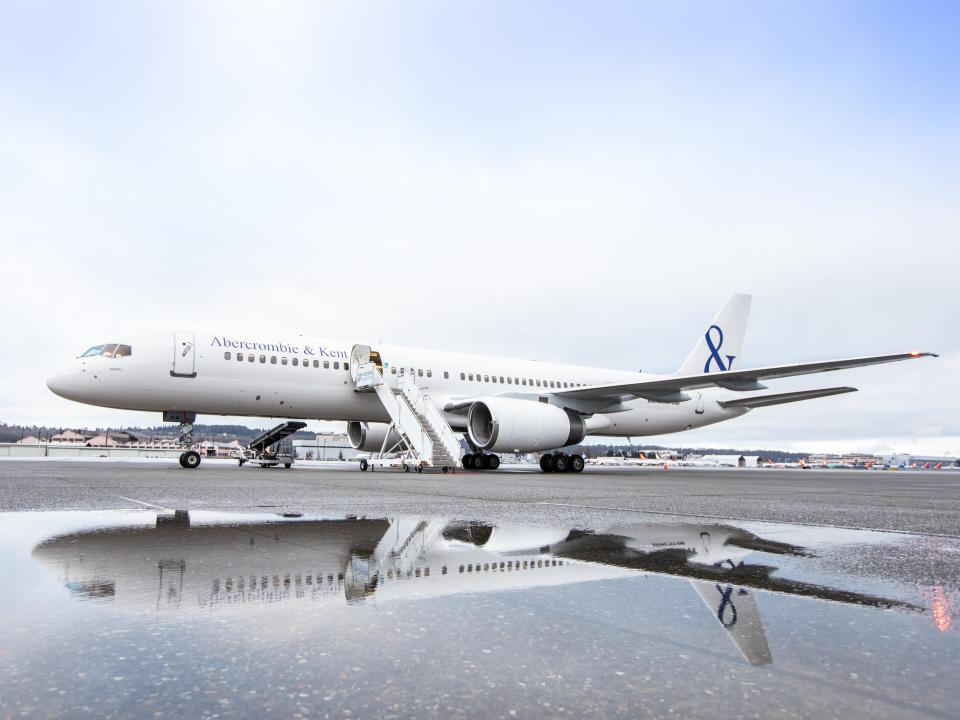 The A&K-branded 757 private jet on the tarmac.